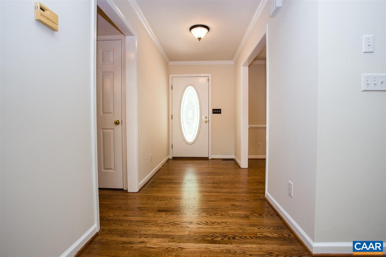 391 Rudolph Street Ruckersville, VA 22968 - Photo 10 of 31 a view of a hallway with wooden floor