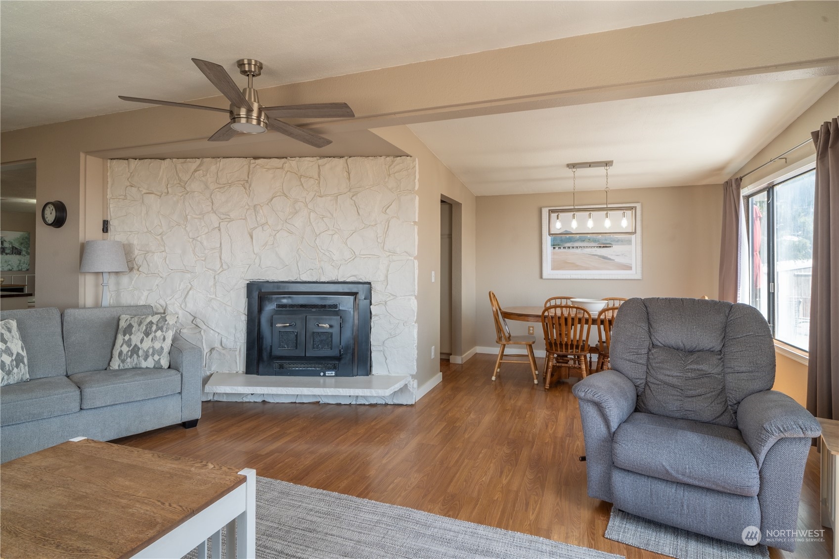 102 East Herman Road Lind, WA 99341 - Photo 11 of 40 a living room with furniture and a fireplace
