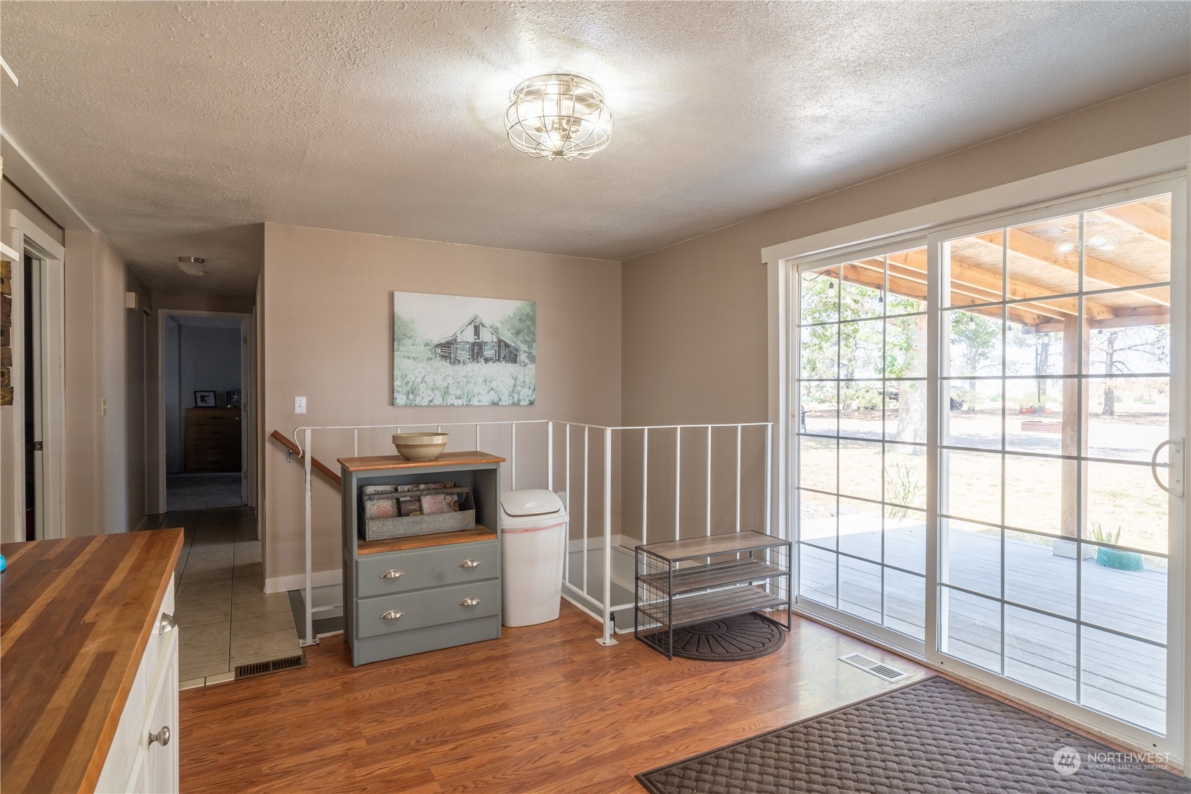 102 East Herman Road Lind, WA 99341 - Photo 16 of 40 a view of a bedroom with furniture and windows