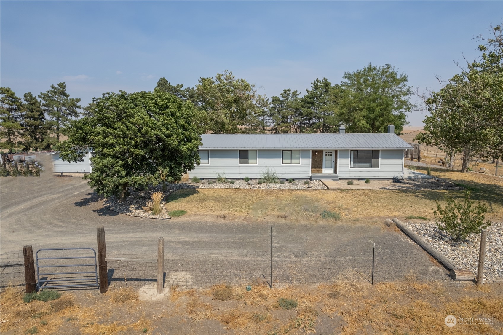 102 East Herman Road Lind, WA 99341 - Photo 2 of 40 a house view with a outdoor space