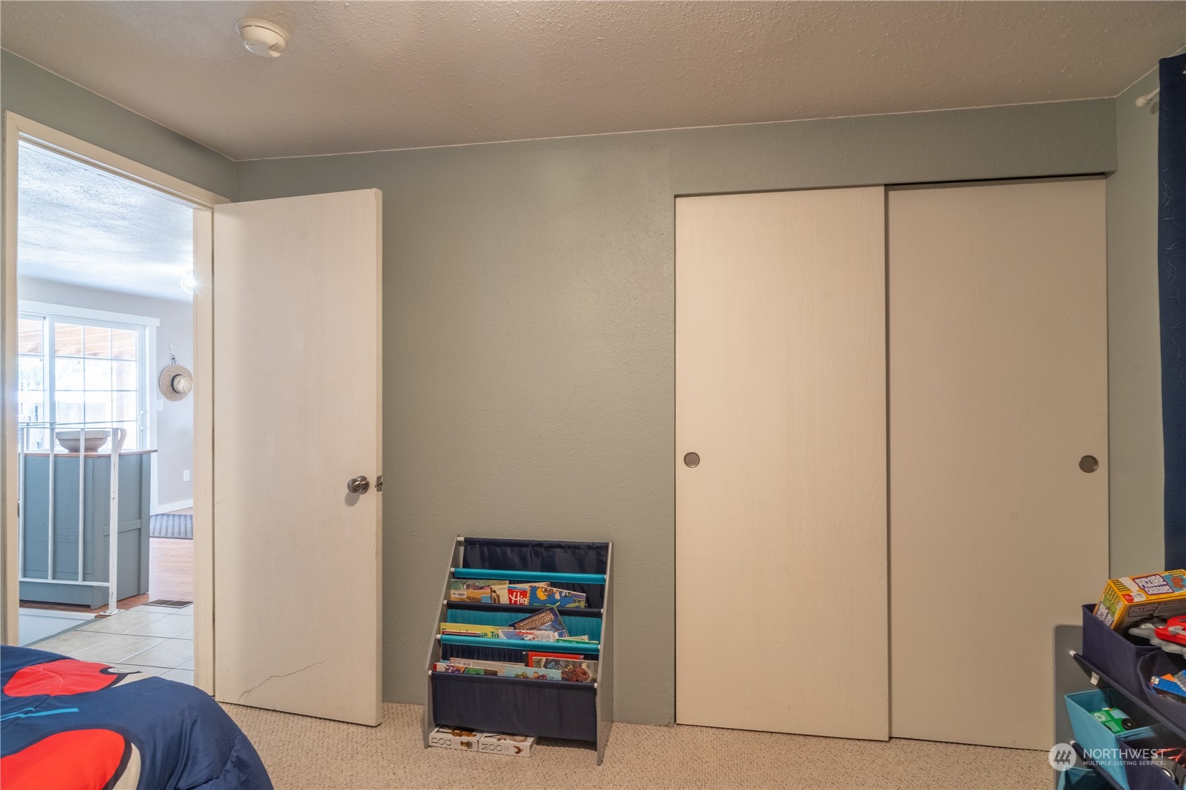 102 East Herman Road Lind, WA 99341 - Photo 21 of 40 a bedroom with a bed and a closet