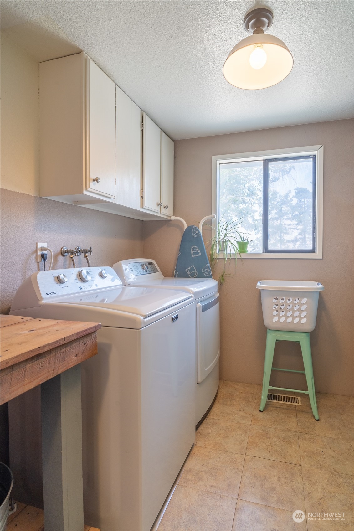 102 East Herman Road Lind, WA 99341 - Photo 23 of 40 a room with storage and utility