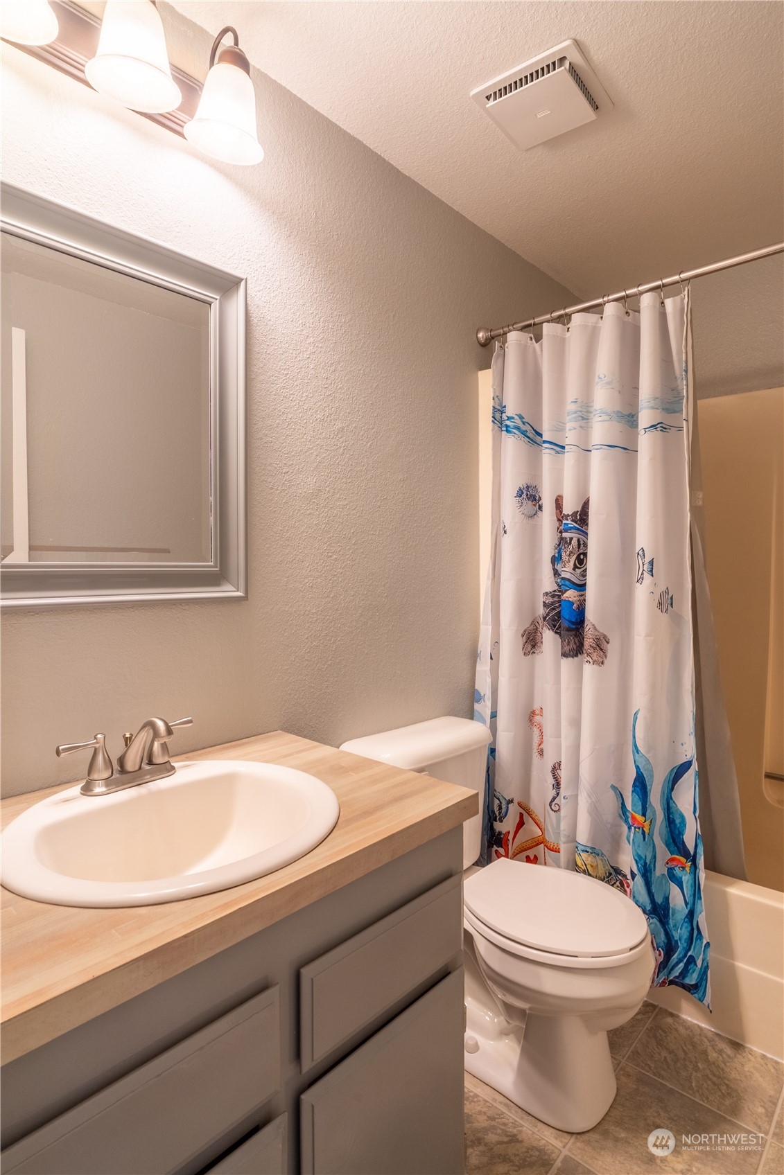 102 East Herman Road Lind, WA 99341 - Photo 24 of 40 a bathroom with a sink toilet and shower