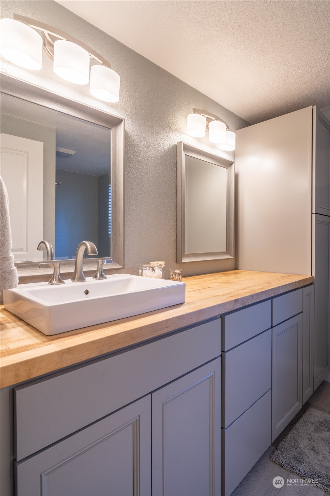 102 East Herman Road Lind, WA 99341 - Photo 28 of 40 a bathroom with a sink and a mirror