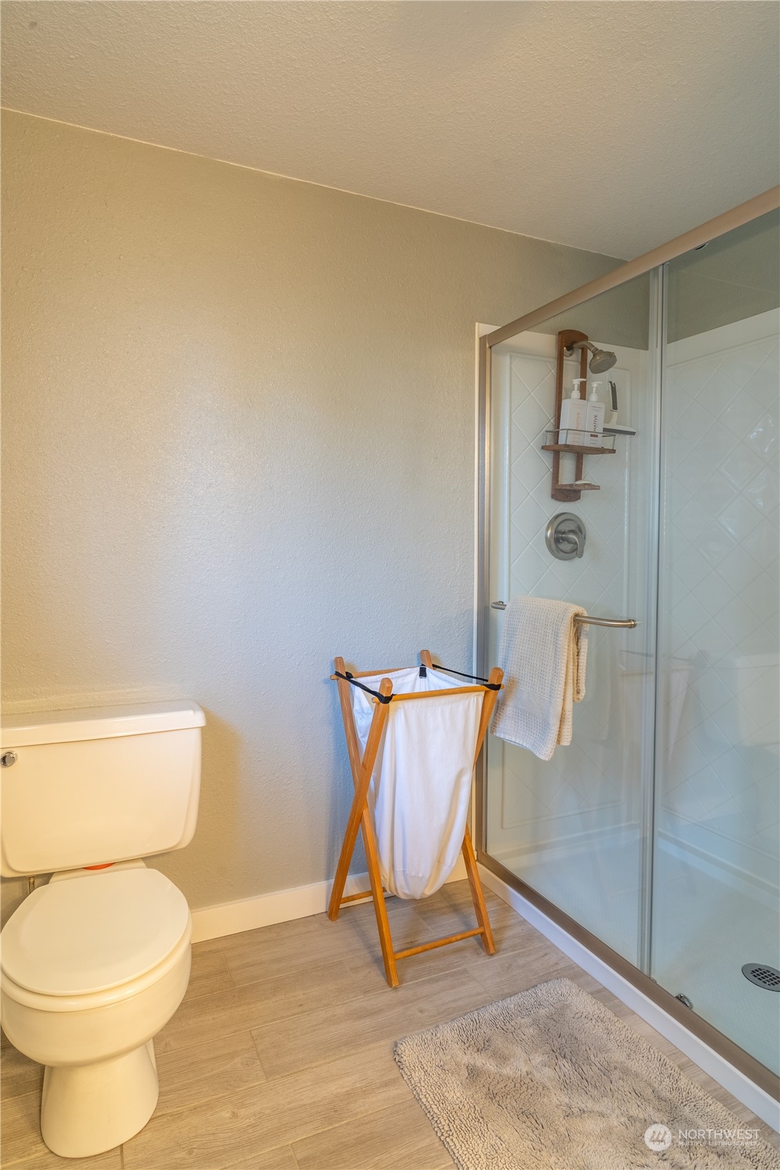 102 East Herman Road Lind, WA 99341 - Photo 29 of 40 a bathroom with a toilet and a shower