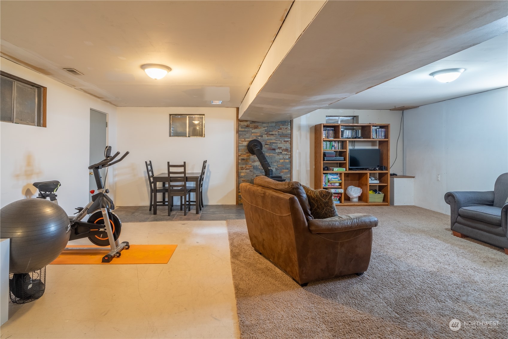 102 East Herman Road Lind, WA 99341 - Photo 30 of 40 a living room with furniture and a flat screen tv