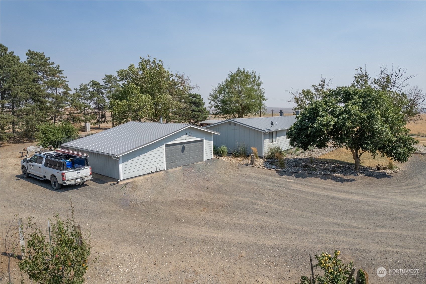 102 East Herman Road Lind, WA 99341 - Photo 3 of 40 a car parked on the side of the road