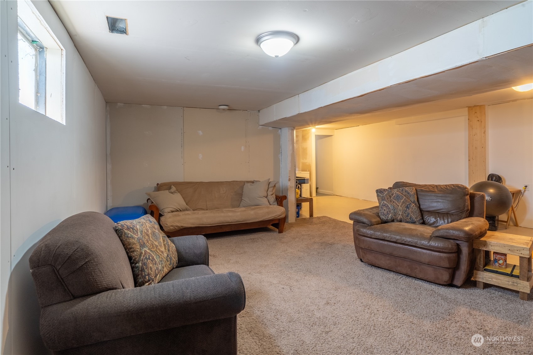 102 East Herman Road Lind, WA 99341 - Photo 32 of 40 a living room with furniture and a large window