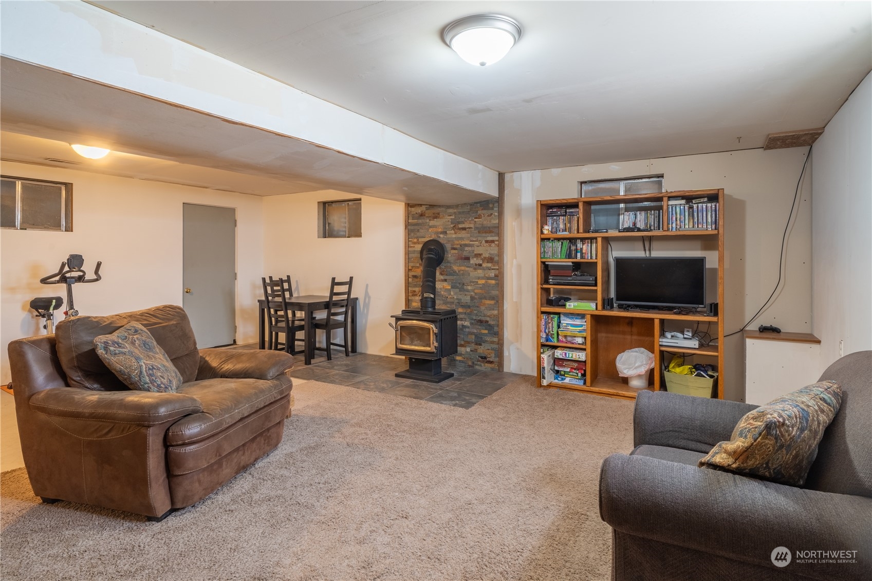 102 East Herman Road Lind, WA 99341 - Photo 33 of 40 a living room with furniture and a flat screen tv