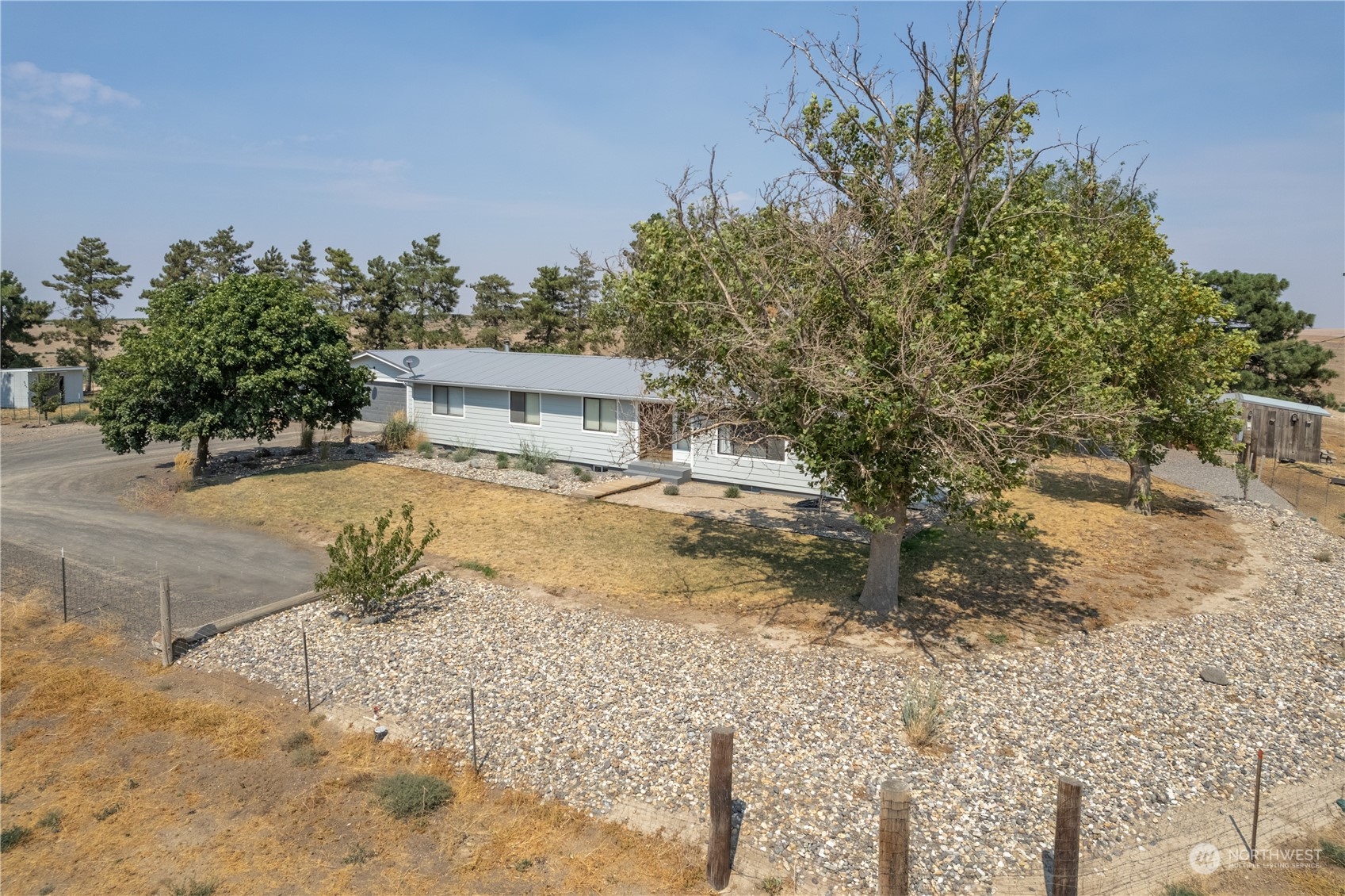 102 East Herman Road Lind, WA 99341 - Photo 6 of 40 a view of a house with a yard
