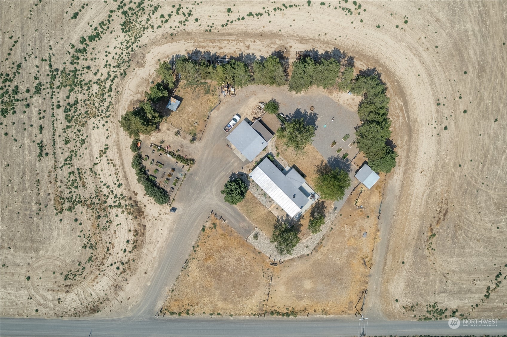 102 East Herman Road Lind, WA 99341 - Photo 7 of 40 a view of a fireplace with wooden floor