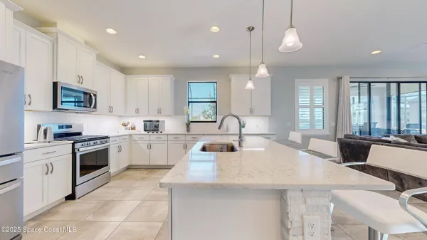 $869,900 | 7553 Poulicny Lane, Melbourne, FL 32940