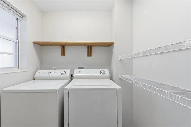 a utility room with dryer and washer