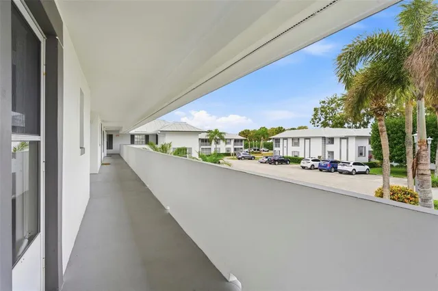 a view of a balcony with a street
