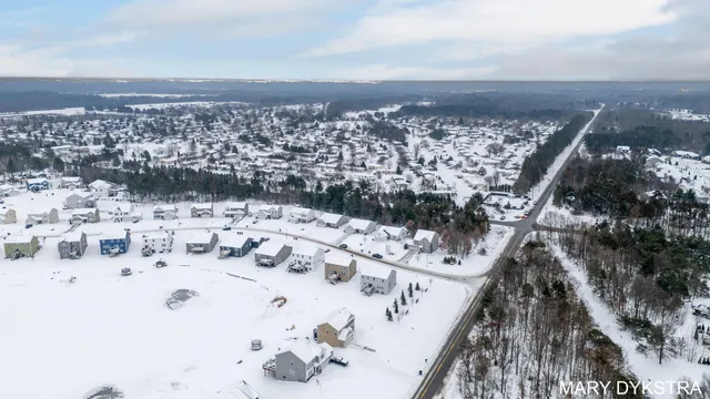 $430,000 | 14579 Tupelo Drive, West Olive, MI 49460