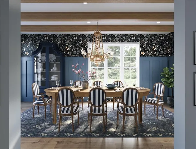 a view of a dining room with furniture and window