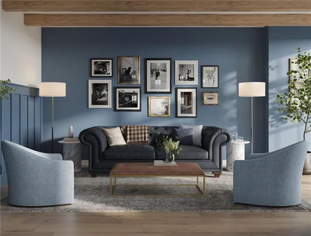 a living room with furniture and painting on the wall