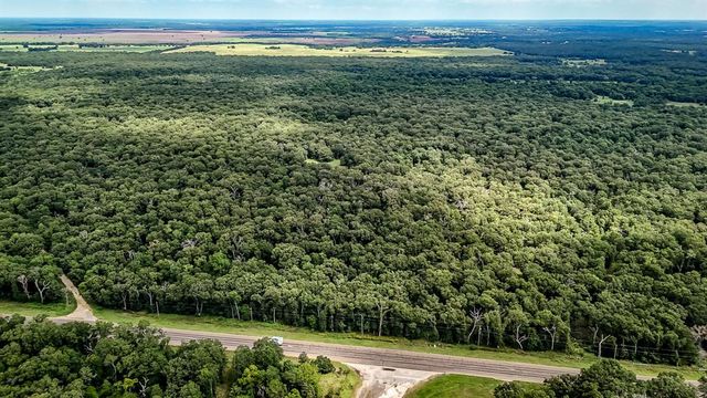 a view of a field with an outdoor space