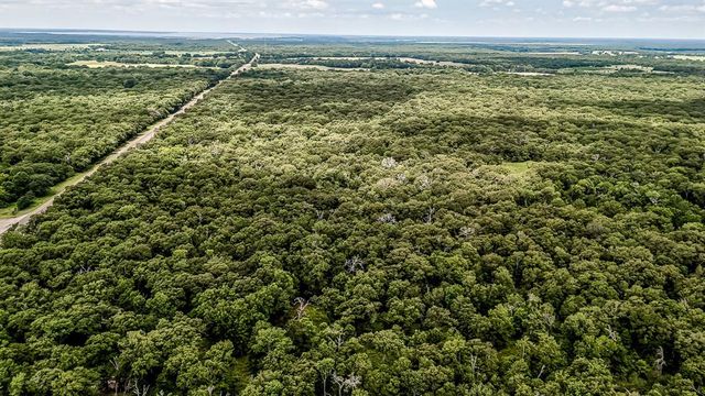a view of a city with an ocean view