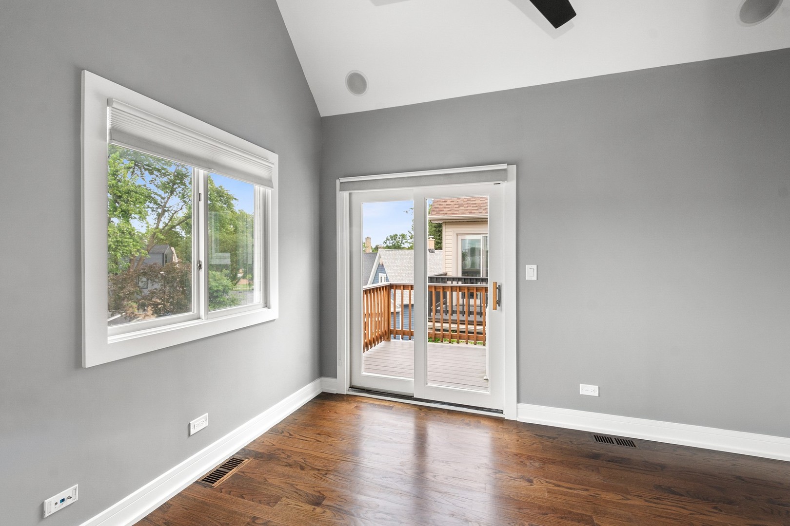 3700 North Kenneth Avenue Chicago, IL 60641 - Photo 18 of 29 a view of an empty room with wooden floor and a window