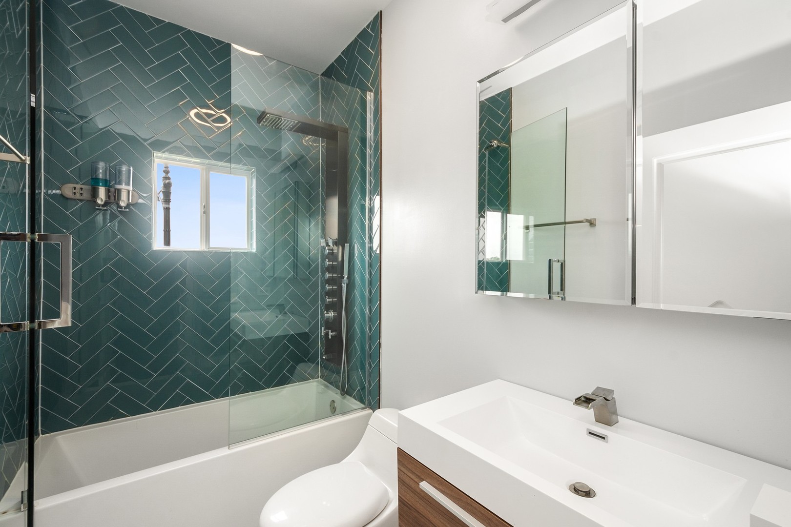 3700 North Kenneth Avenue Chicago, IL 60641 - Photo 19 of 29 a bathroom with a sink a toilet and shower