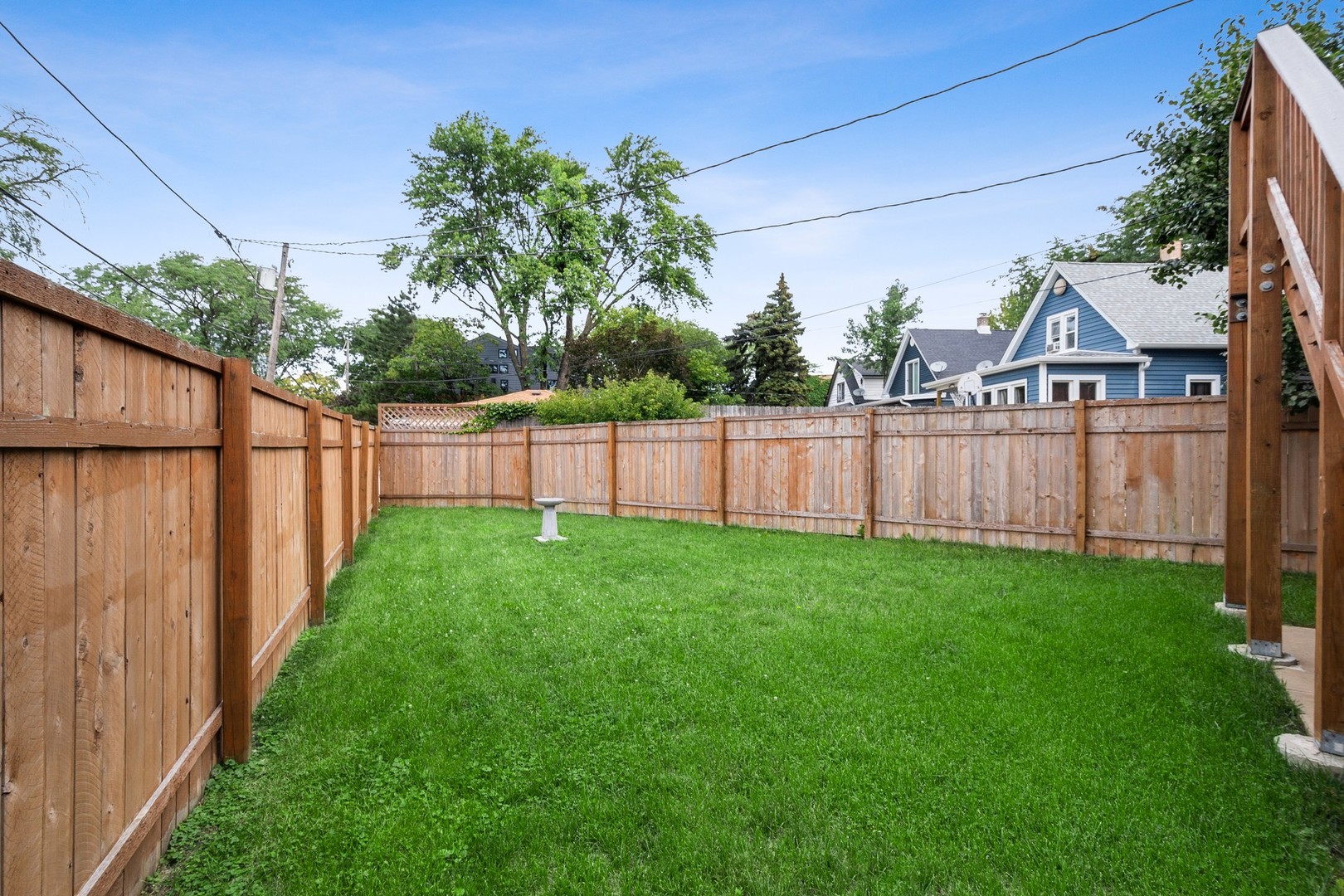 3700 North Kenneth Avenue Chicago, IL 60641 - Photo 23 of 29 a view of a backyard with wooden fence
