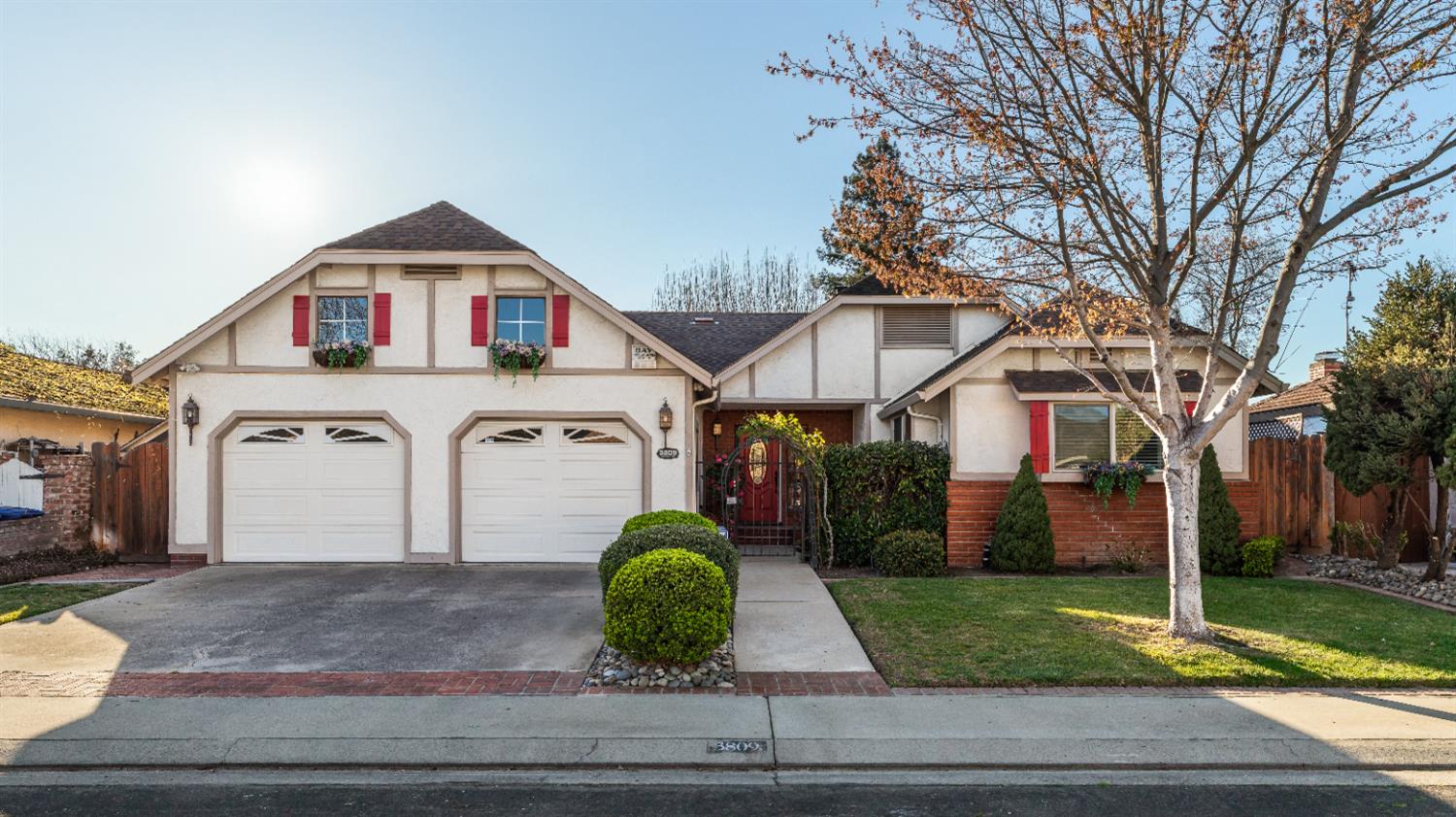 Tudor styling highlights the exterior of this Bloomfield beauty!  Featuring two spacious bedrooms, 2 full bathrooms and approximately 1831 square feet, this home offers a pool and spa too! Designed for easy-care living, this updated gem is ready for you...