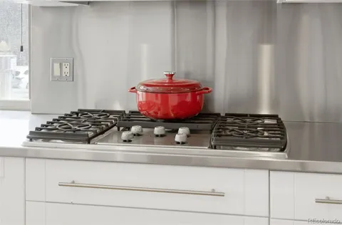 a view of a dining room with furniture and windows
