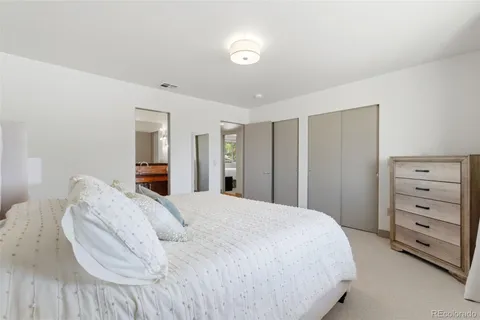 a view of a balcony with chairs