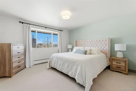 a view of a balcony with furniture