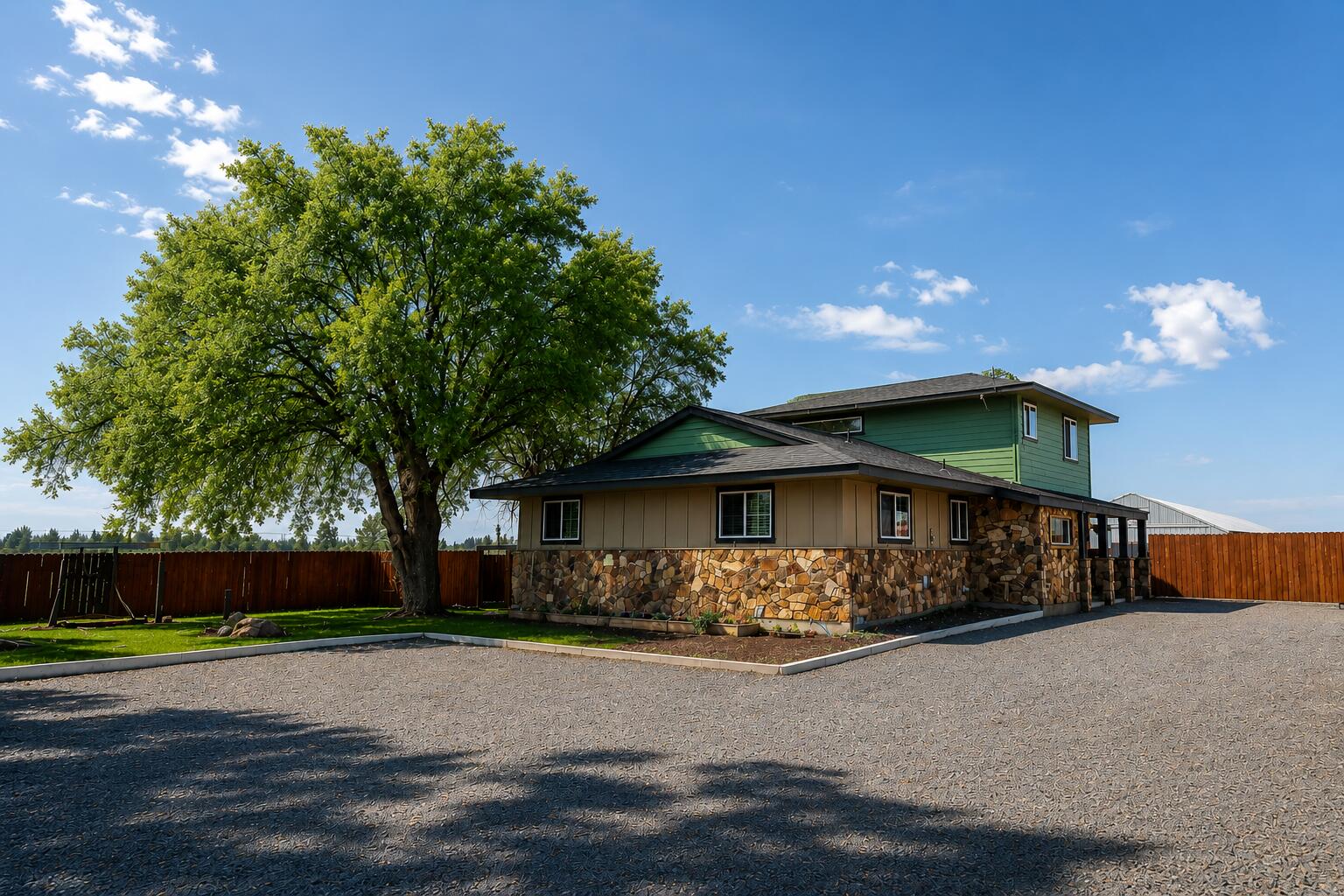 26695 Horsell Road Bend, OR 97701 - Photo 2 of 33 a front view of a house with garden