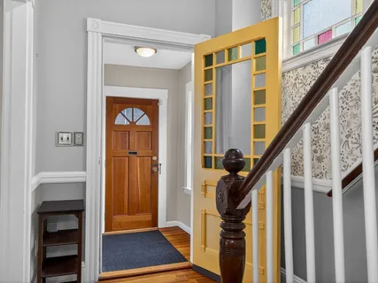 a view of an entryway with a front door