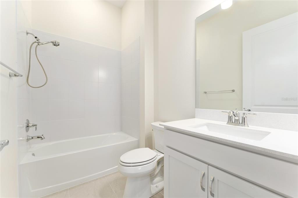 6023 Southwest 86th Circle Ocala, FL 34481 - Photo 34 of 55 a bathroom with a sink a toilet and shower