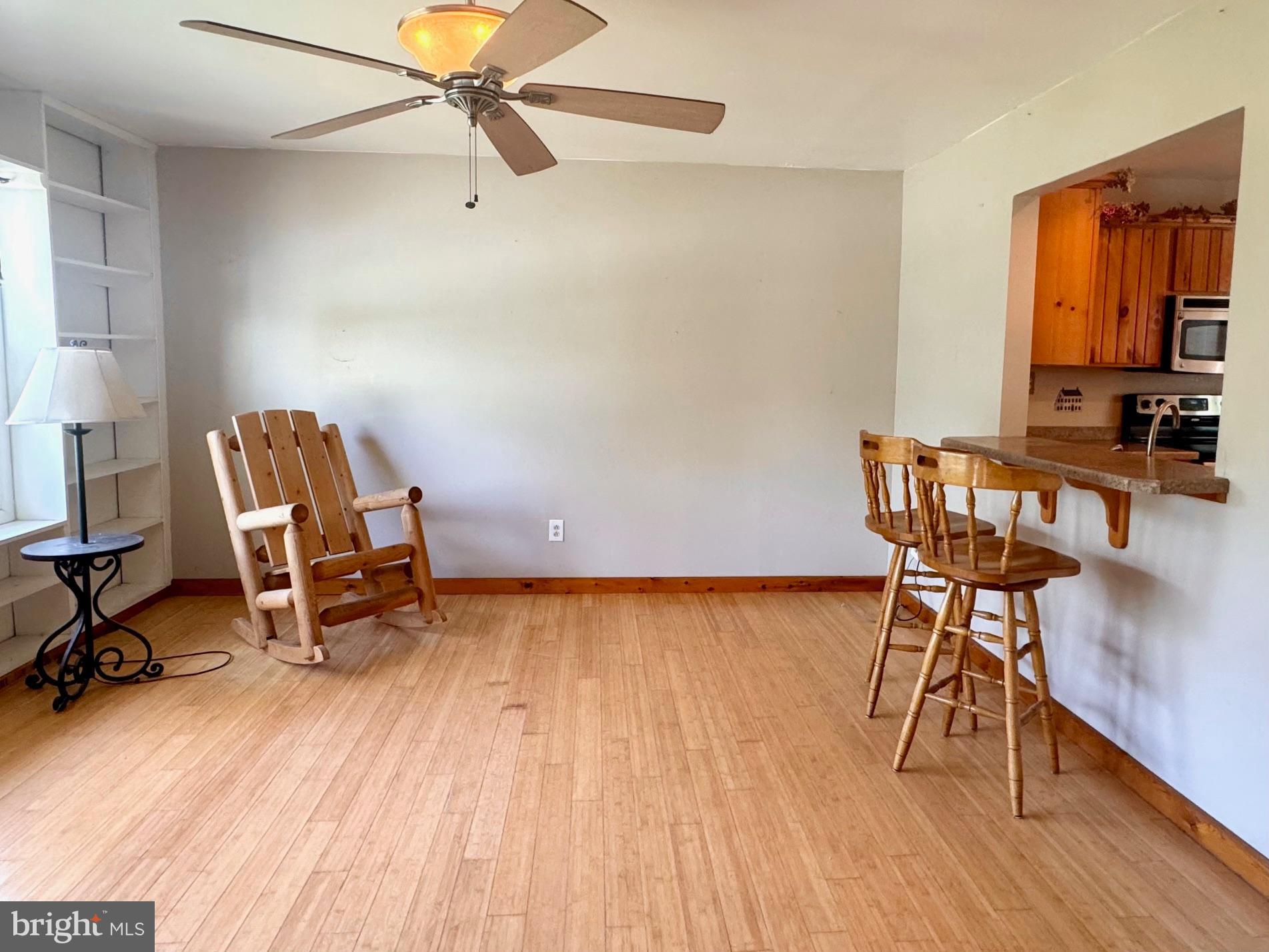 124 Buddtown Road Southampton, NJ 08088 - Photo 13 of 45 a view of a workspace with furniture and wooden floor