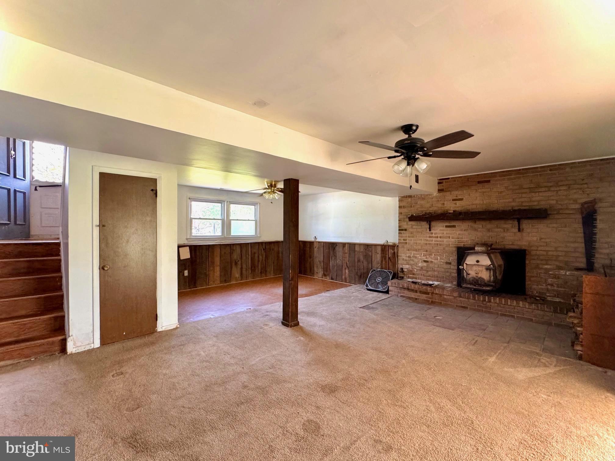 124 Buddtown Road Southampton, NJ 08088 - Photo 27 of 45 an empty room with windows and fireplace