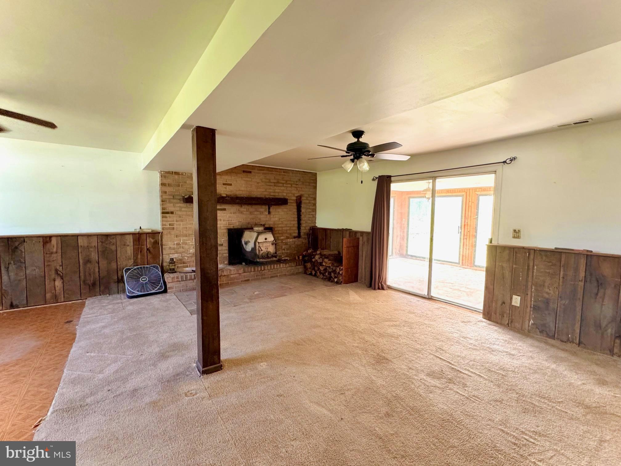 124 Buddtown Road Southampton, NJ 08088 - Photo 29 of 45 a view of a livingroom with furniture and a ceiling fan