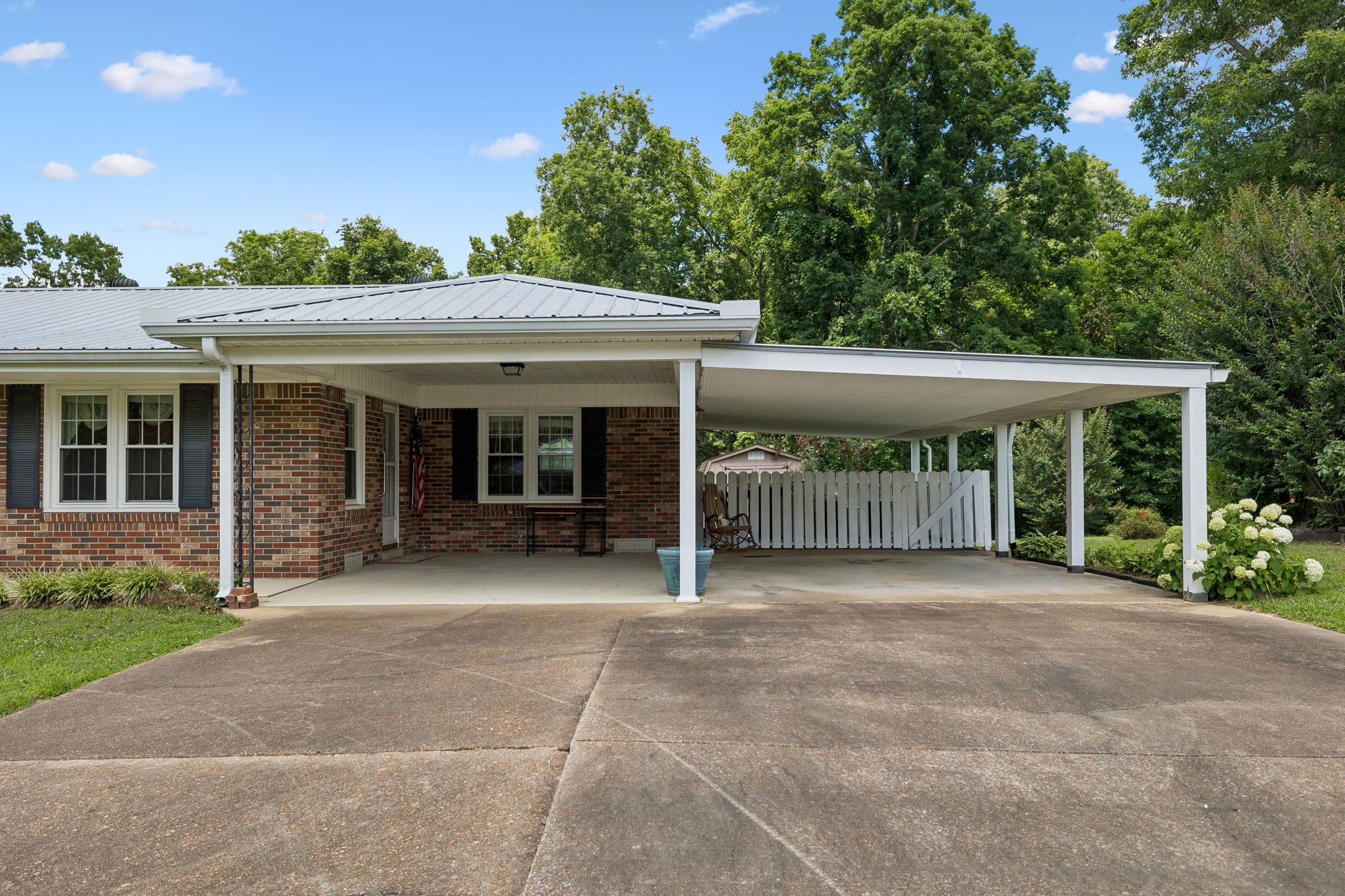 708 Hickory Street Centerville, TN 37033 - Photo 6 of 57 a view of a house with a garden