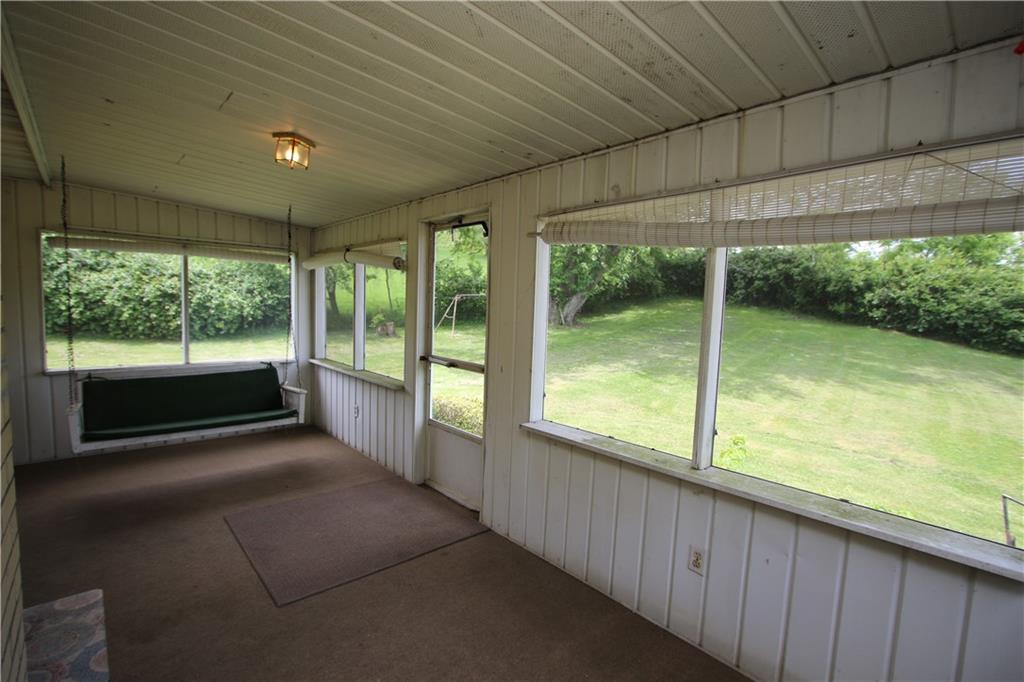 269 Rte 481 Fredericktown, PA 15333 - Photo 6 of 30 Awesome 19x8 Enclosed Sun Porch off Eat-in Kitchen boasting Incredible Views of Private 1/2 Acre Yard! Enjoy this Country Setting inside & out!