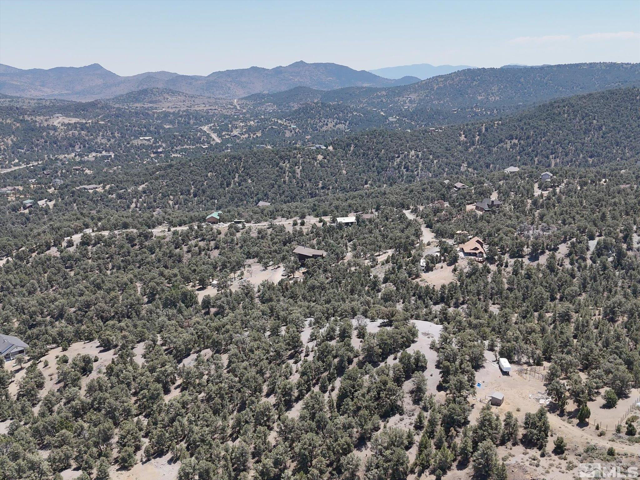 2040 Alpine Road Reno, NV 89521 - Photo 7 of 12 a view of a mountain in the distance in a field