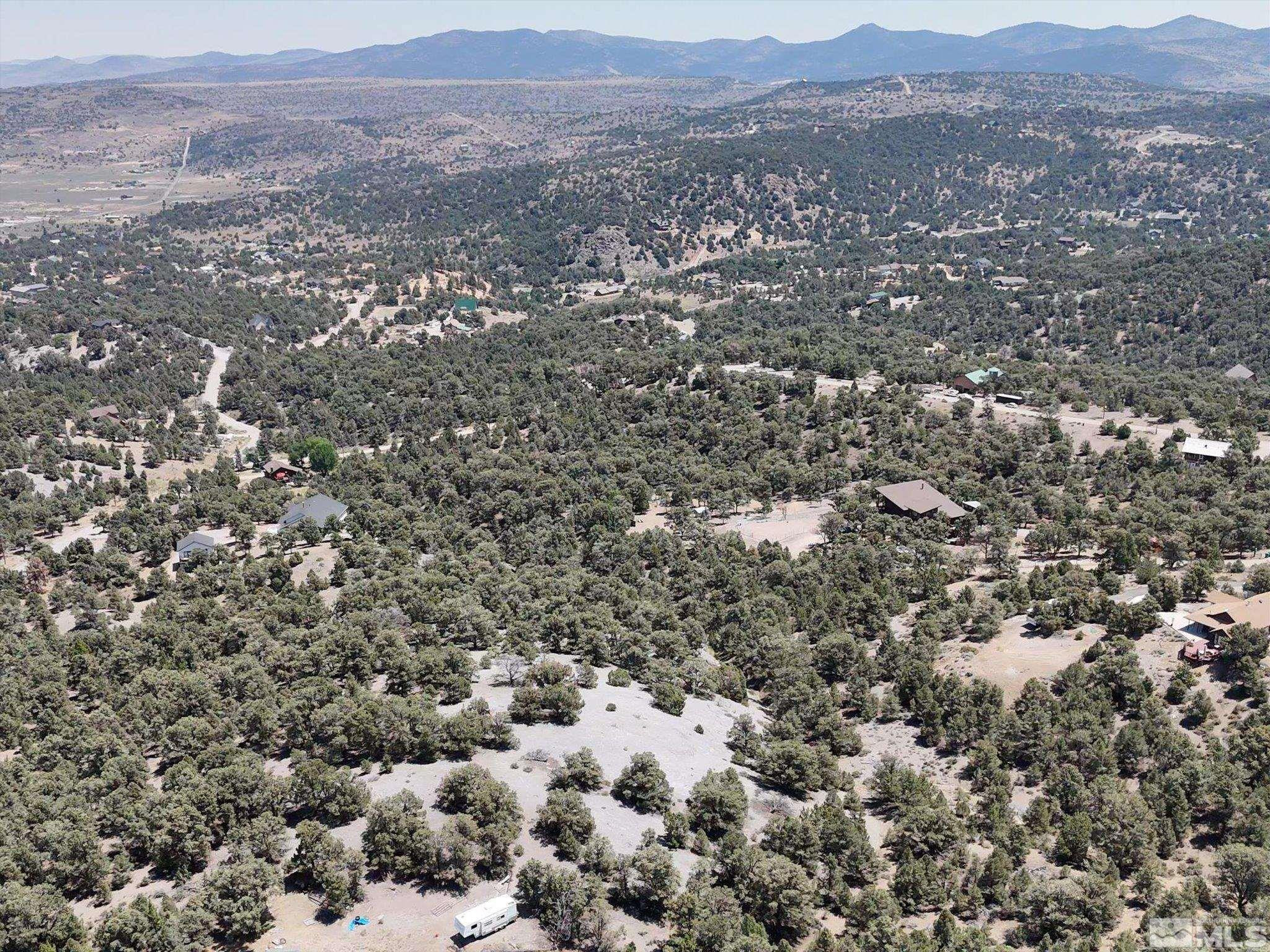 2040 Alpine Road Reno, NV 89521 - Photo 8 of 12 an aerial view of house with yard and mountain view in back