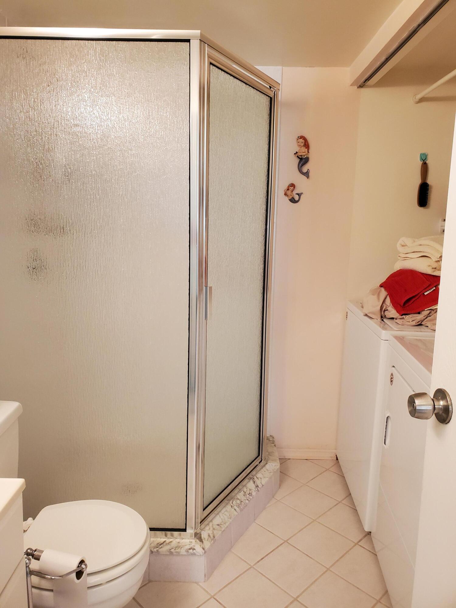 717 Highway 1, Unit 707 Jupiter, FL 33477 - Photo 15 of 30 Guest bath/laundry
