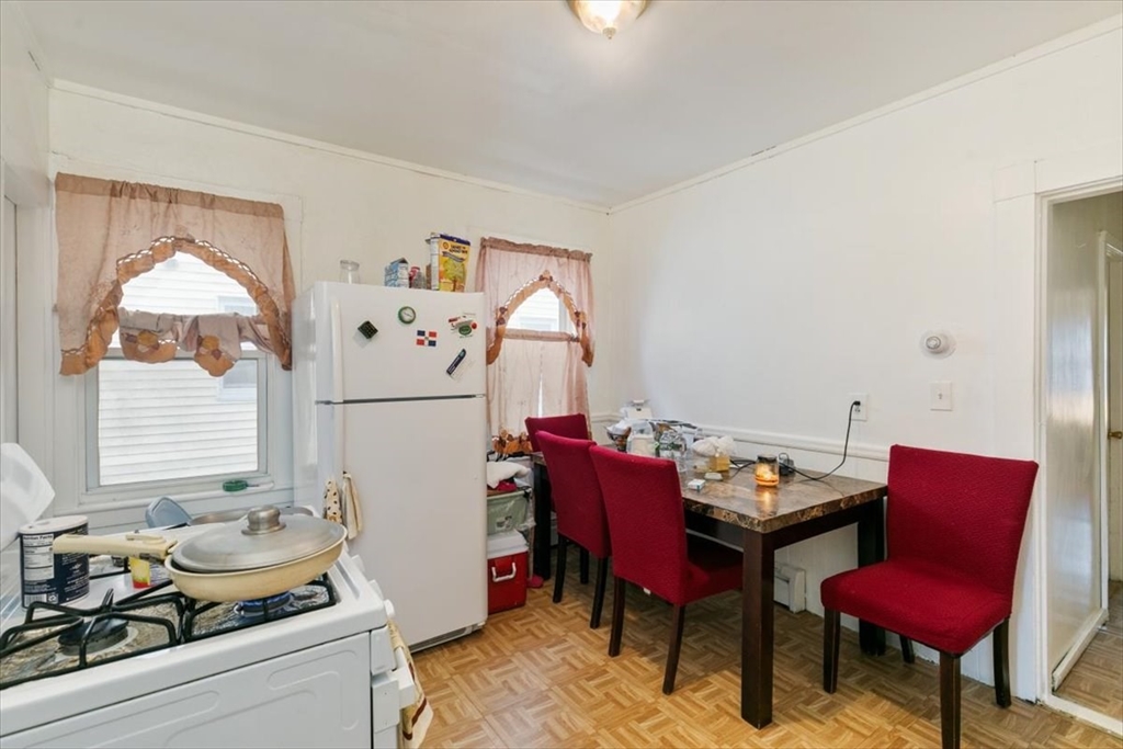 2 Washington Street Lawrence, MA 01841 - Photo 14 of 28 a dining room with furniture