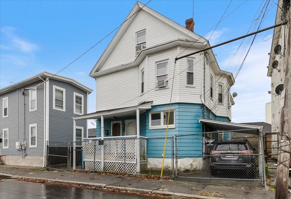 2 Washington Street Lawrence, MA 01841 - Photo 2 of 28 a view of a house with a street