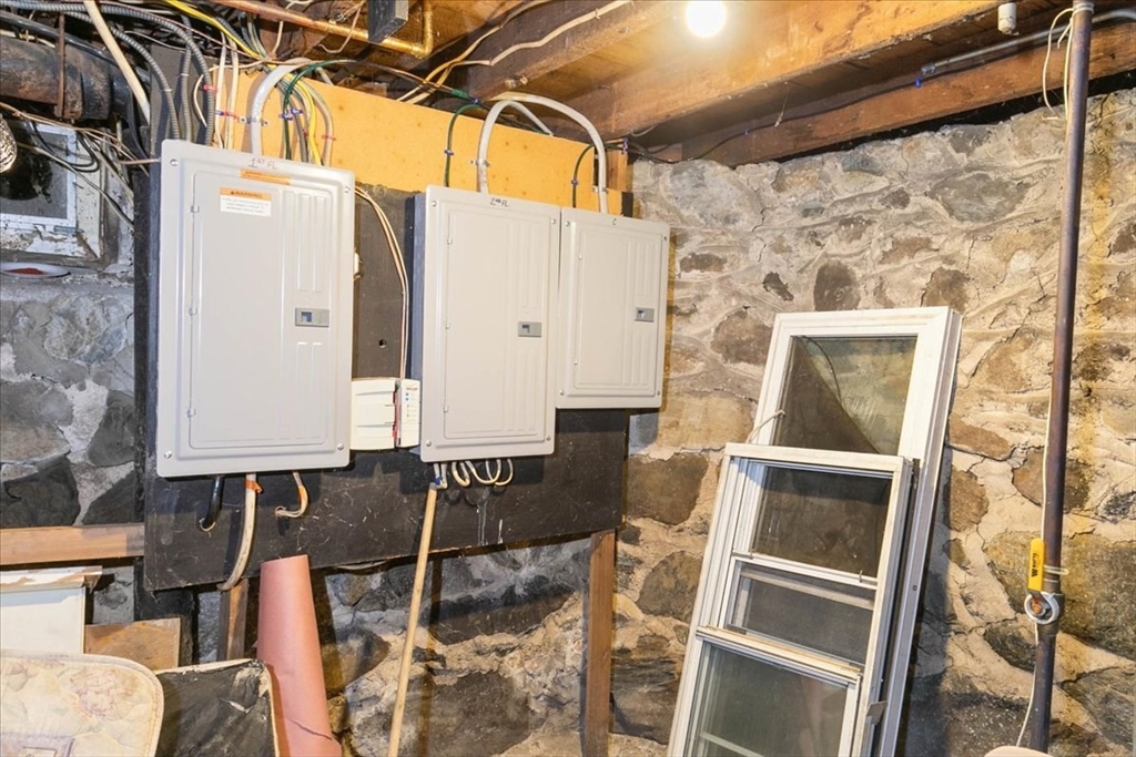 2 Washington Street Lawrence, MA 01841 - Photo 26 of 28 a front view of a house with parking space