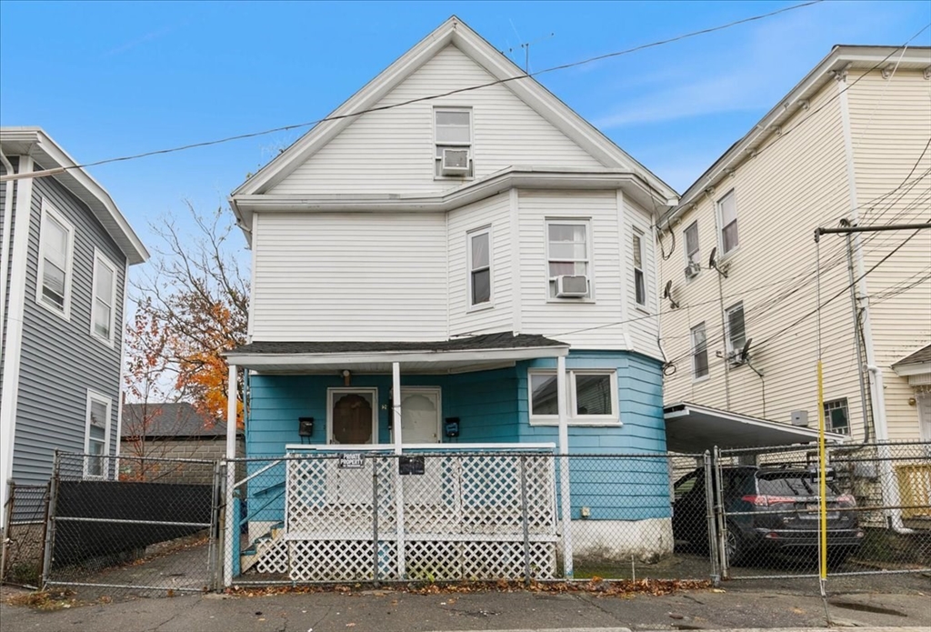 2 Washington Street Lawrence, MA 01841 - Photo 3 of 28 a view of a white house