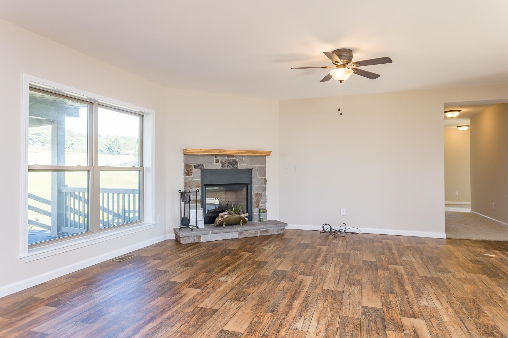 17333 Timberview Drive Timberville, VA 22853 - Photo 25 of 68 a view of empty room with wooden floor and fan