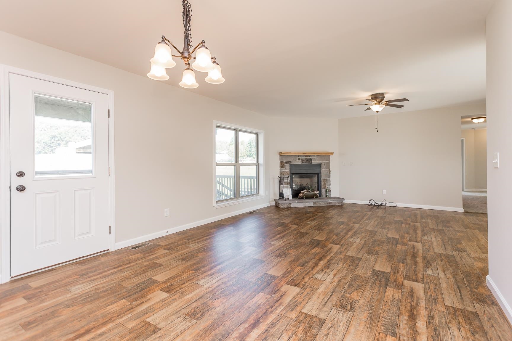 17333 Timberview Drive Timberville, VA 22853 - Photo 27 of 68 a view of a livingroom with a hardwood floor and a ceiling fan