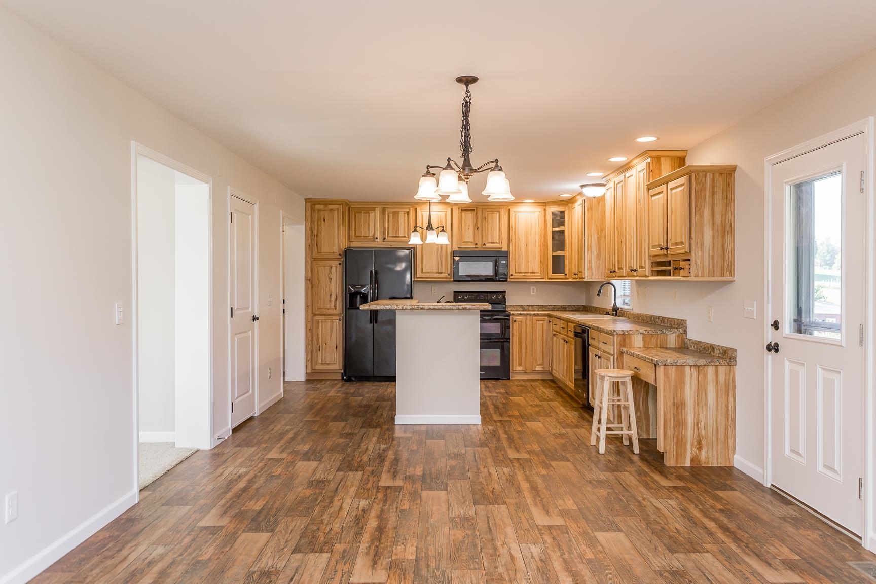 17333 Timberview Drive Timberville, VA 22853 - Photo 28 of 68 a kitchen with stainless steel appliances granite countertop a stove top oven a sink dishwasher and a refrigerator