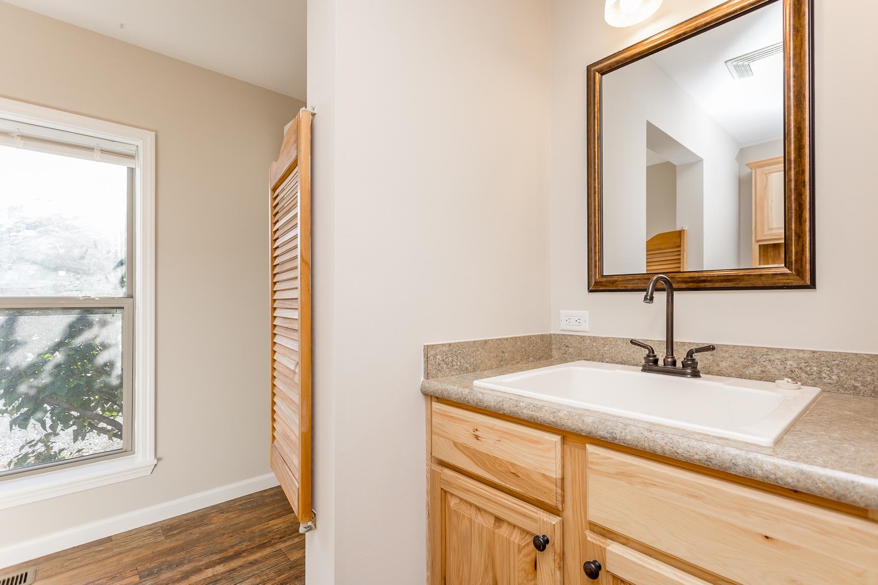 17333 Timberview Drive Timberville, VA 22853 - Photo 38 of 68 a bathroom with a sink and a mirror