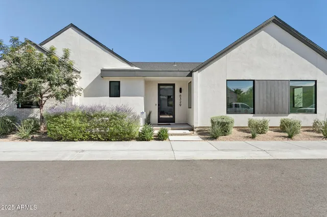 front view of a house with a patio